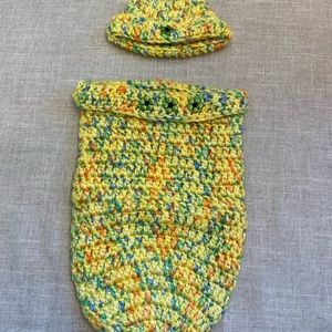 Crocheted baby hat with matching cocoon.